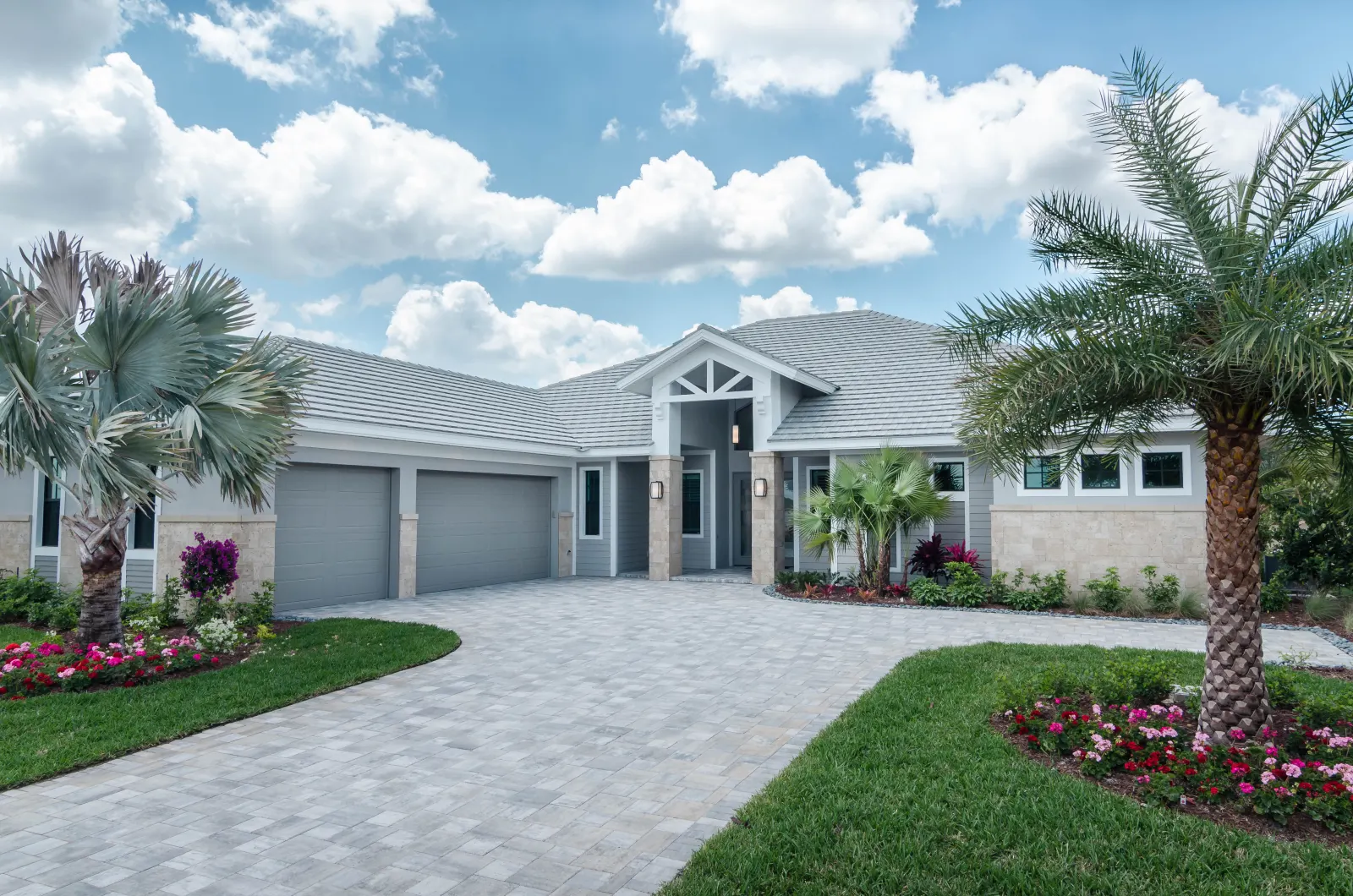 Exterior front at The Captiva Model, a custom home built by Marvin Homes in Naples, Florida