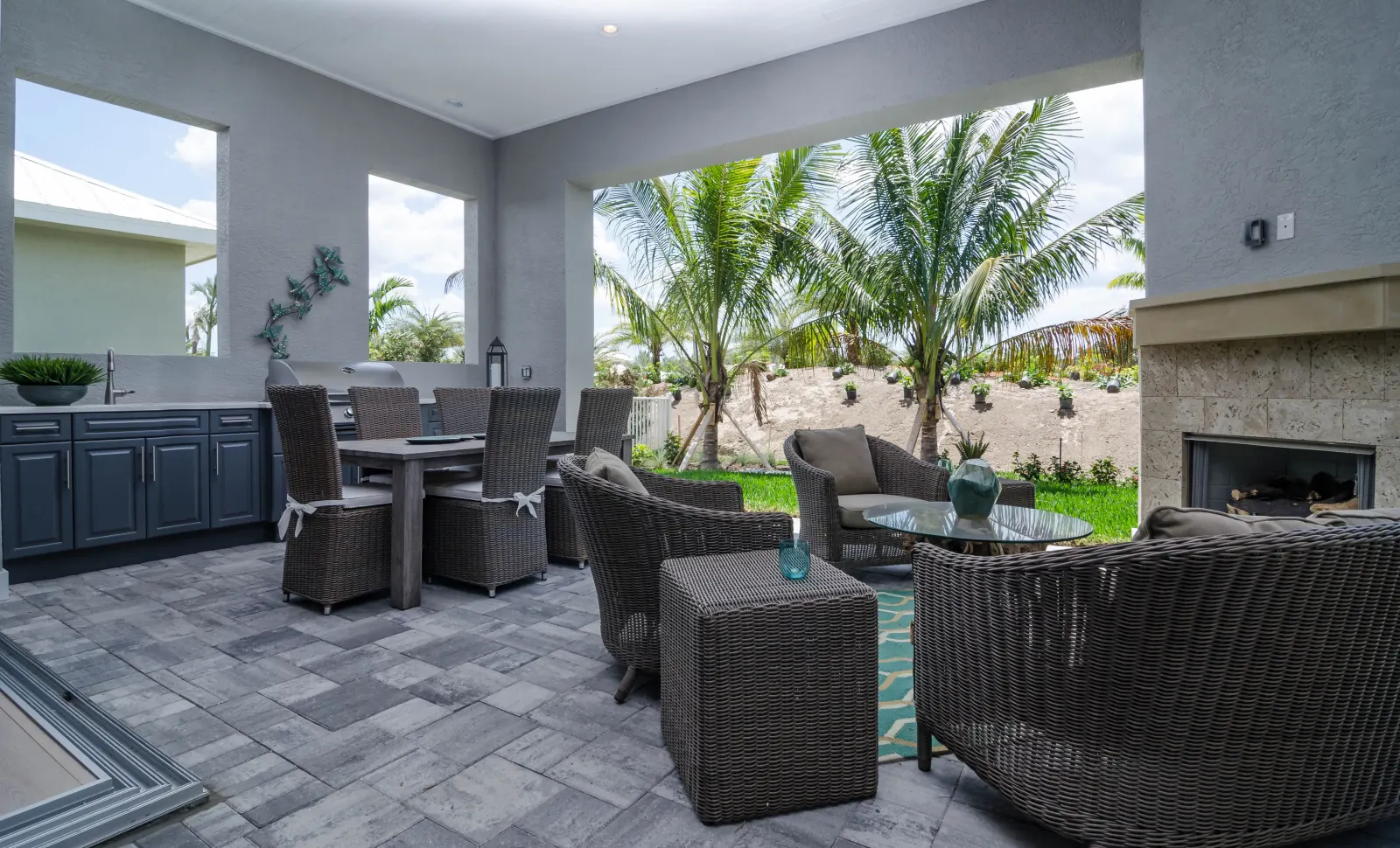 Outdoor living at The Captiva Model, a custom home built by Marvin Homes in Naples, Florida