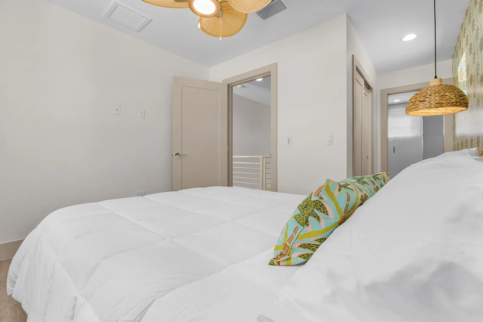Bedroom hallway view at The Flamingo, a custom home built by Marvin Homes in Fort Myers Beach, Florida