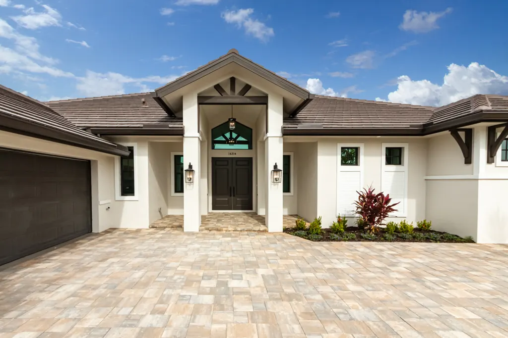 Exterior entry closeup at The Heron House, a custom home built by Marvin Homes in Naples, Florida