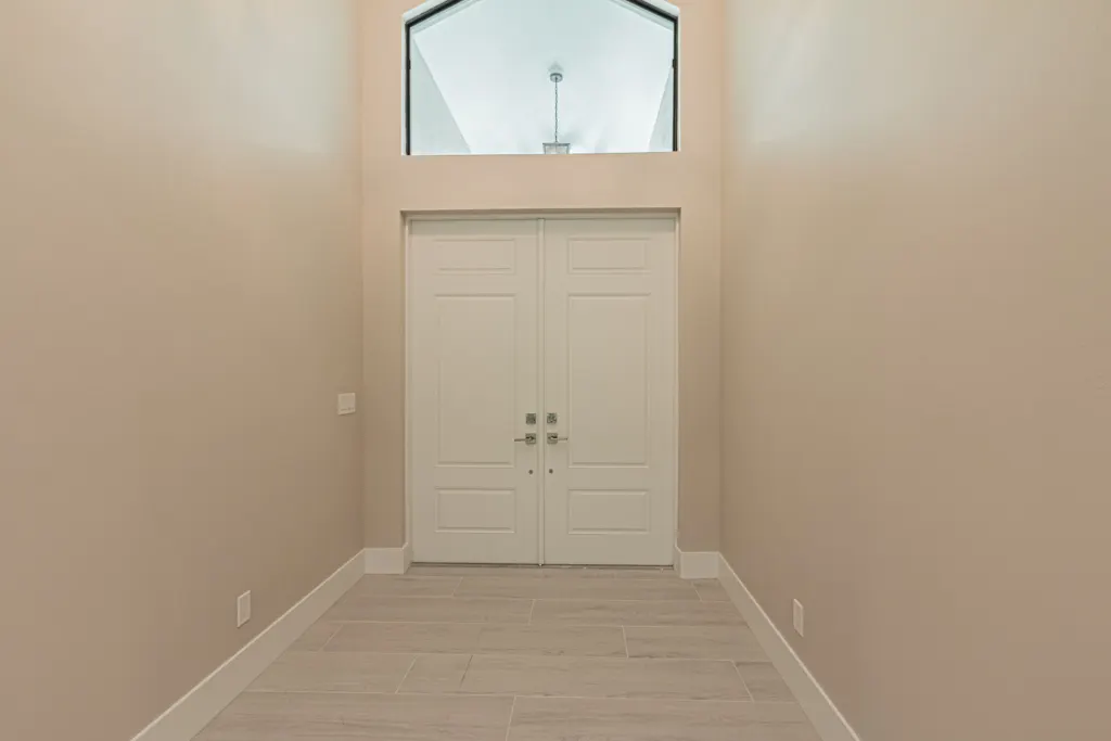 Foyer entry at The Heron House, a custom home built by Marvin Homes in Naples, Florida