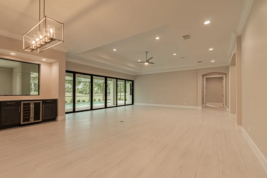 Great room wet bar at The Heron House, a custom home built by Marvin Homes in Naples, Florida
