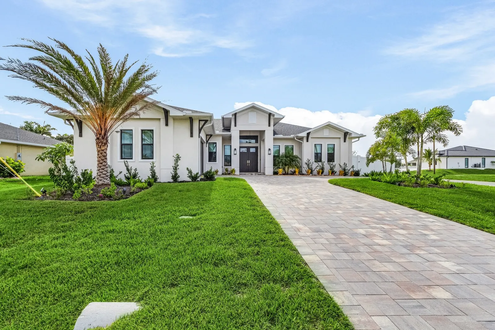 Exterior front at The Ibis, a custom home built by Marvin Homes in Cape Coral, Florida