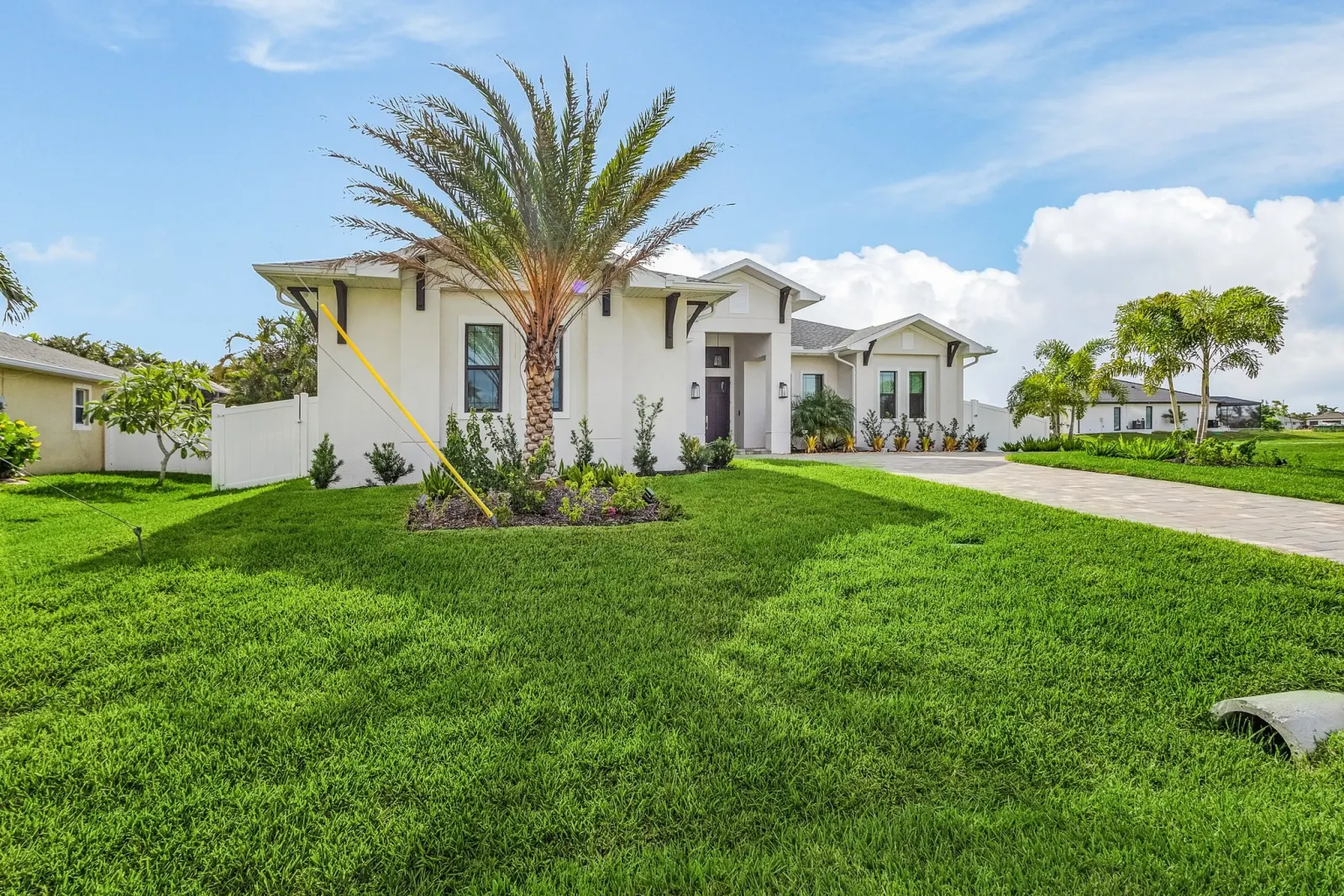Exterior side at The Ibis, a custom home built by Marvin Homes in Cape Coral, Florida