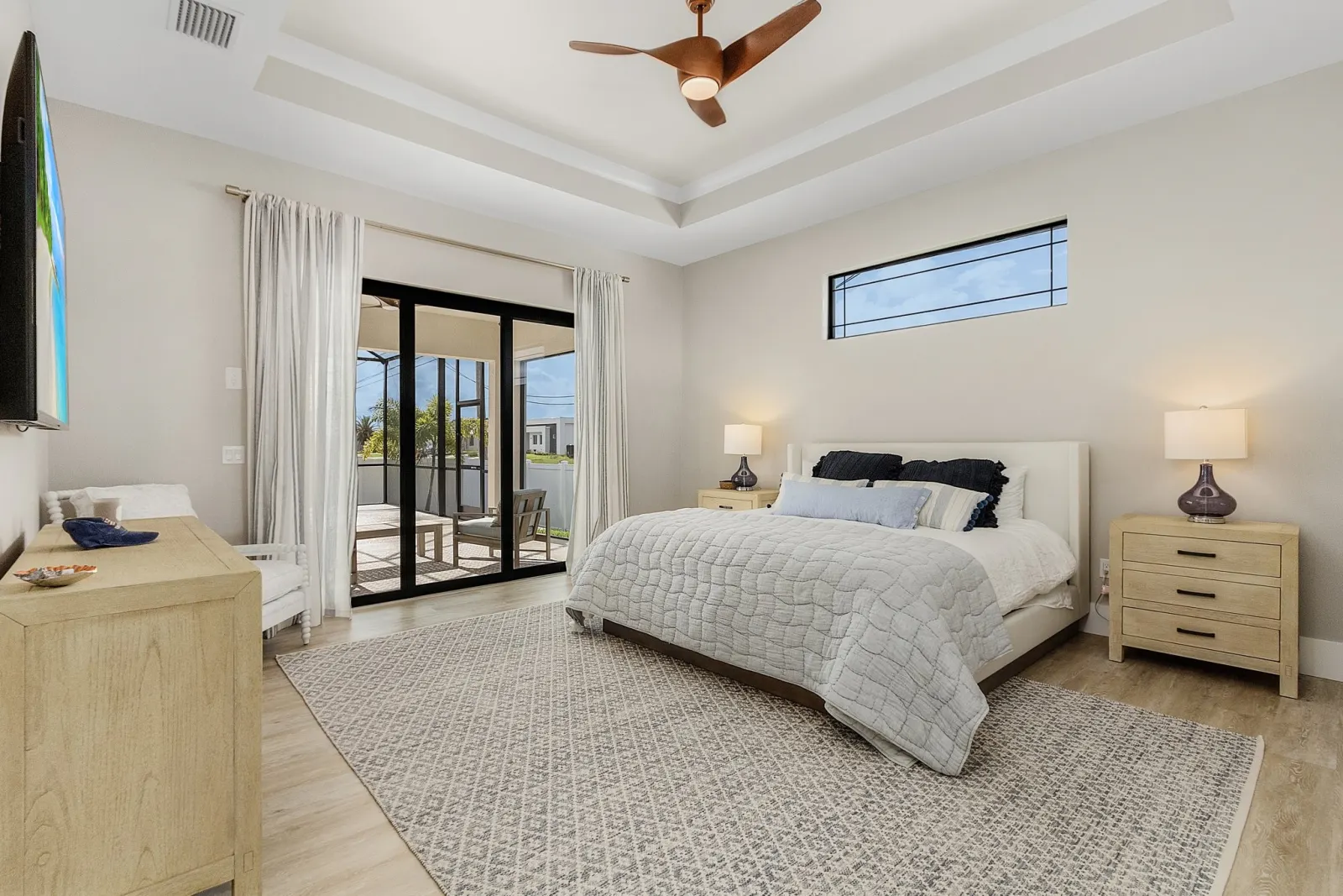 Master bedroom at The Ibis, a custom home built by Marvin Homes in Cape Coral, Florida