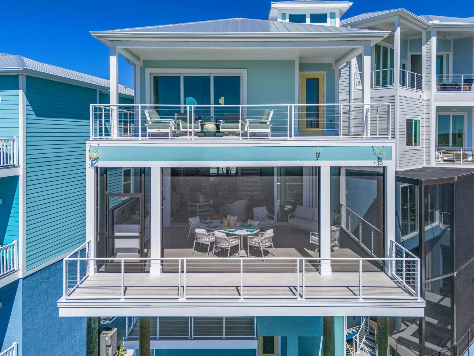 Exterior balconies closeup at The Marlin, a custom home built by Marvin Homes in Cape Coral, Florida
