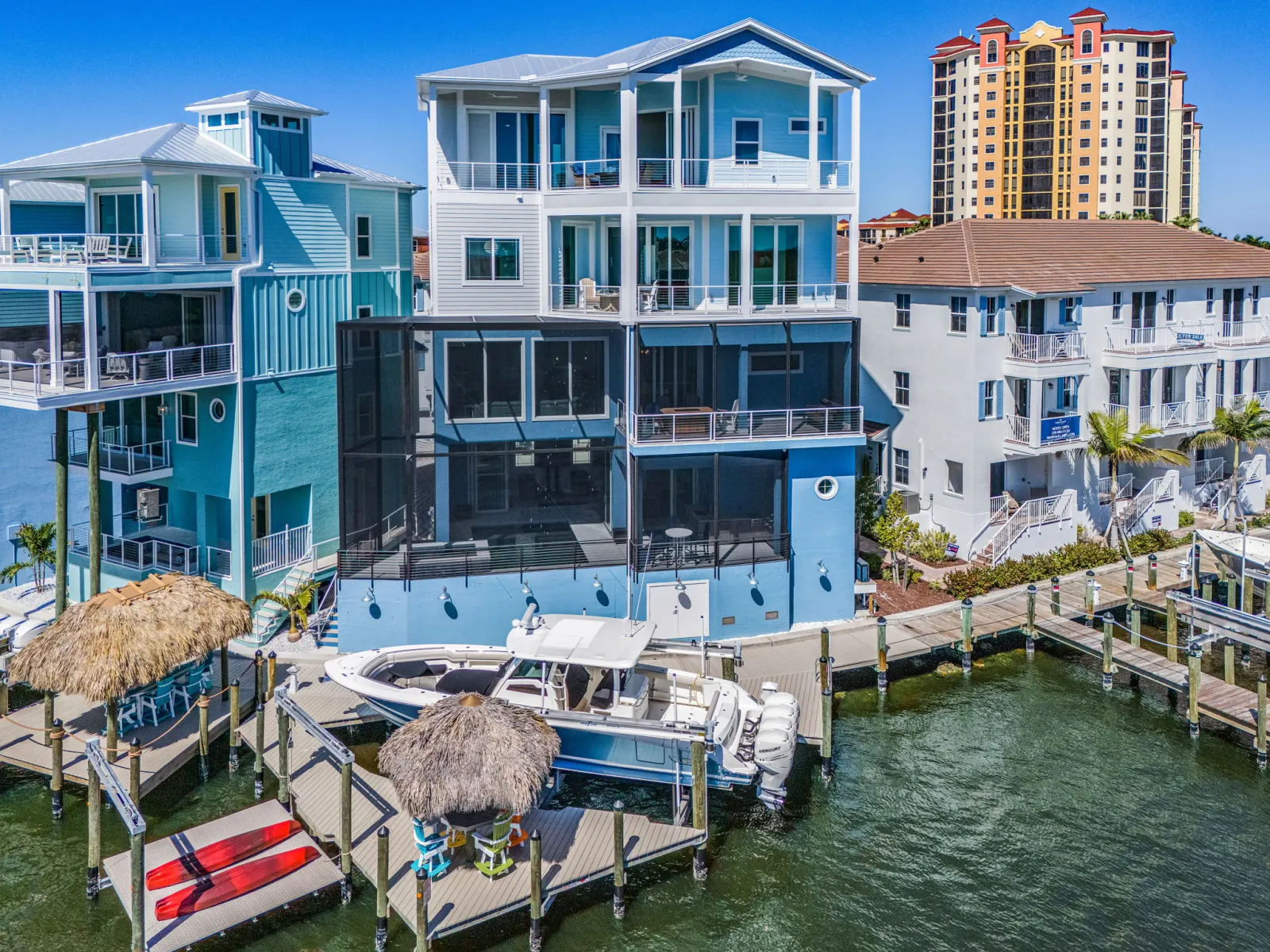 Exterior dock rear view at The Marlin, a custom home built by Marvin Homes in Cape Coral, Florida
