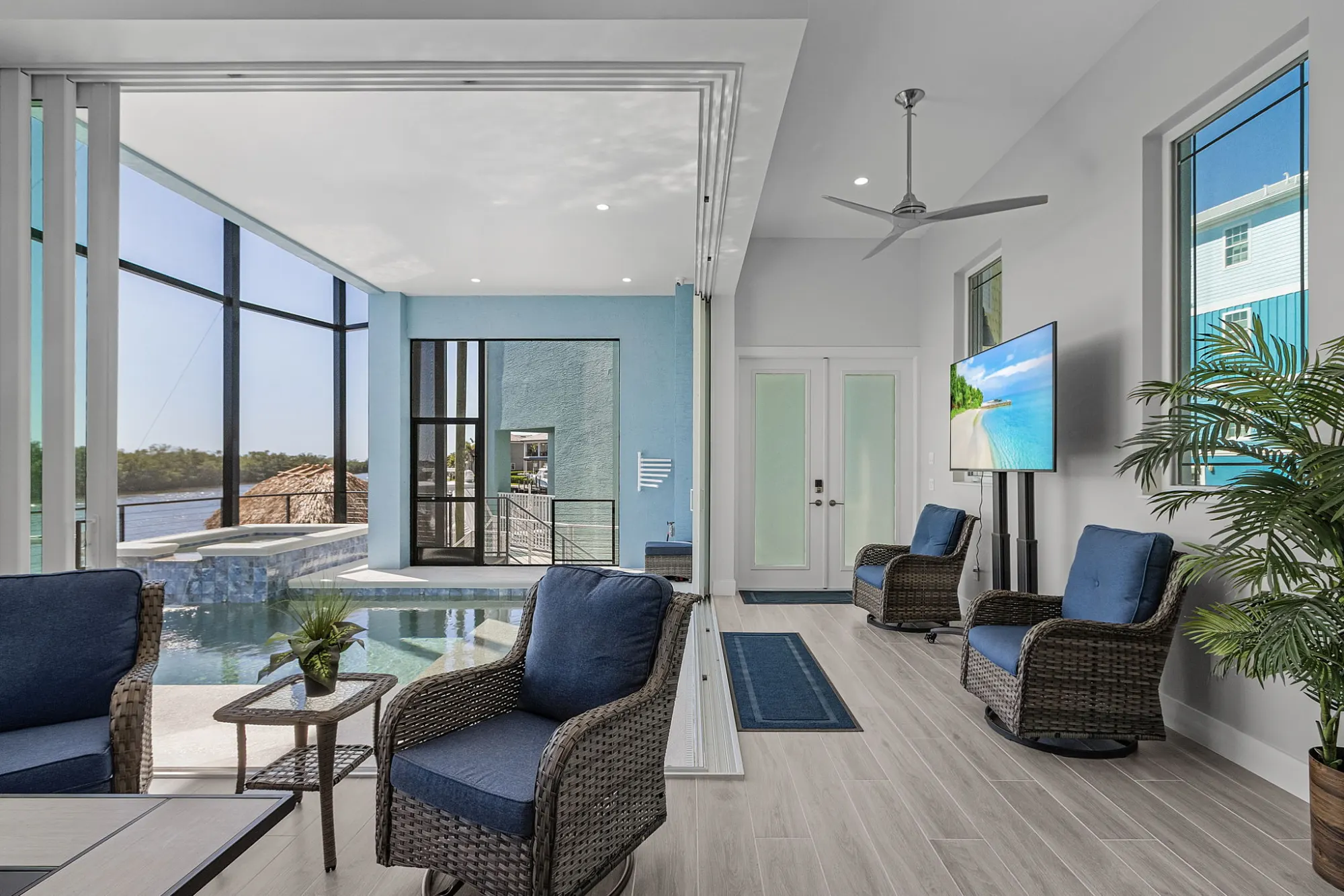 Pool lanai disappearing doors — custom home built by Marvin Homes in Southwest Florida