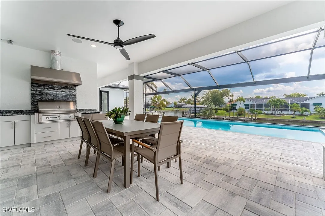 Back patio dining grill at Sturgeon's Landing, a custom home built by Marvin Homes in Cape Coral, Florida