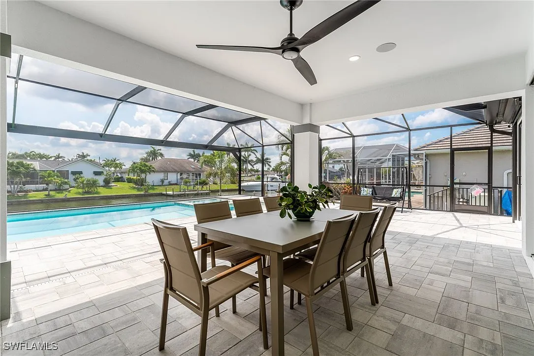Back patio dining at Sturgeon's Landing, a custom home built by Marvin Homes in Cape Coral, Florida