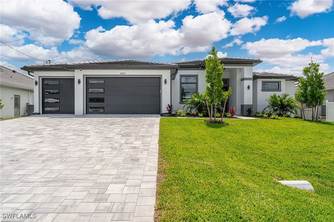 Exterior front at Sturgeon's Landing, a custom home built by Marvin Homes in Cape Coral, Florida