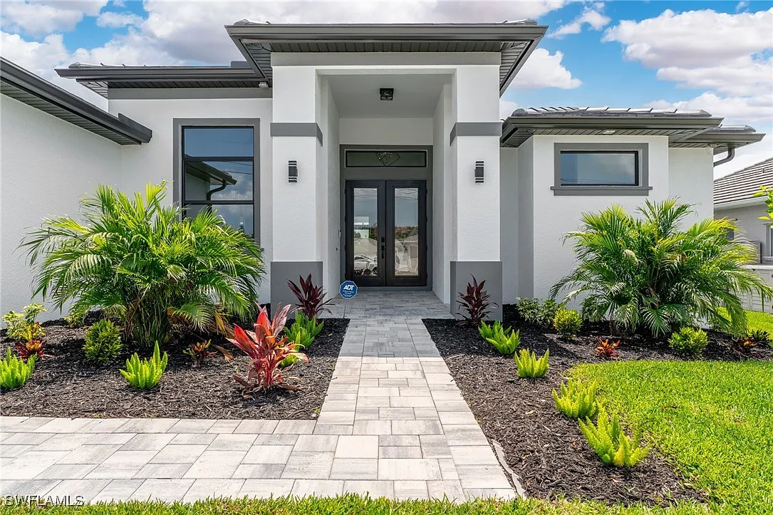 Exterior front at Sturgeon's Landing, a custom home built by Marvin Homes in Cape Coral, Florida