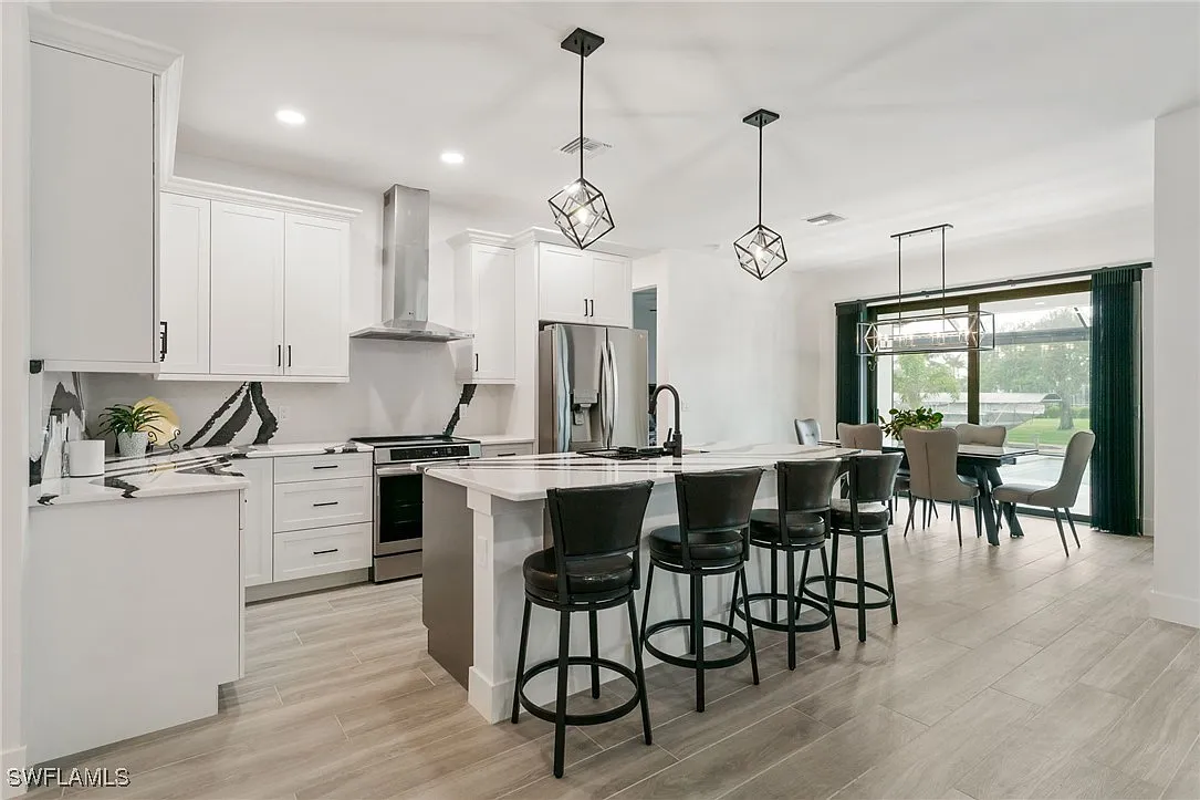 Kitchen dining at Sturgeon's Landing, a custom home built by Marvin Homes in Cape Coral, Florida