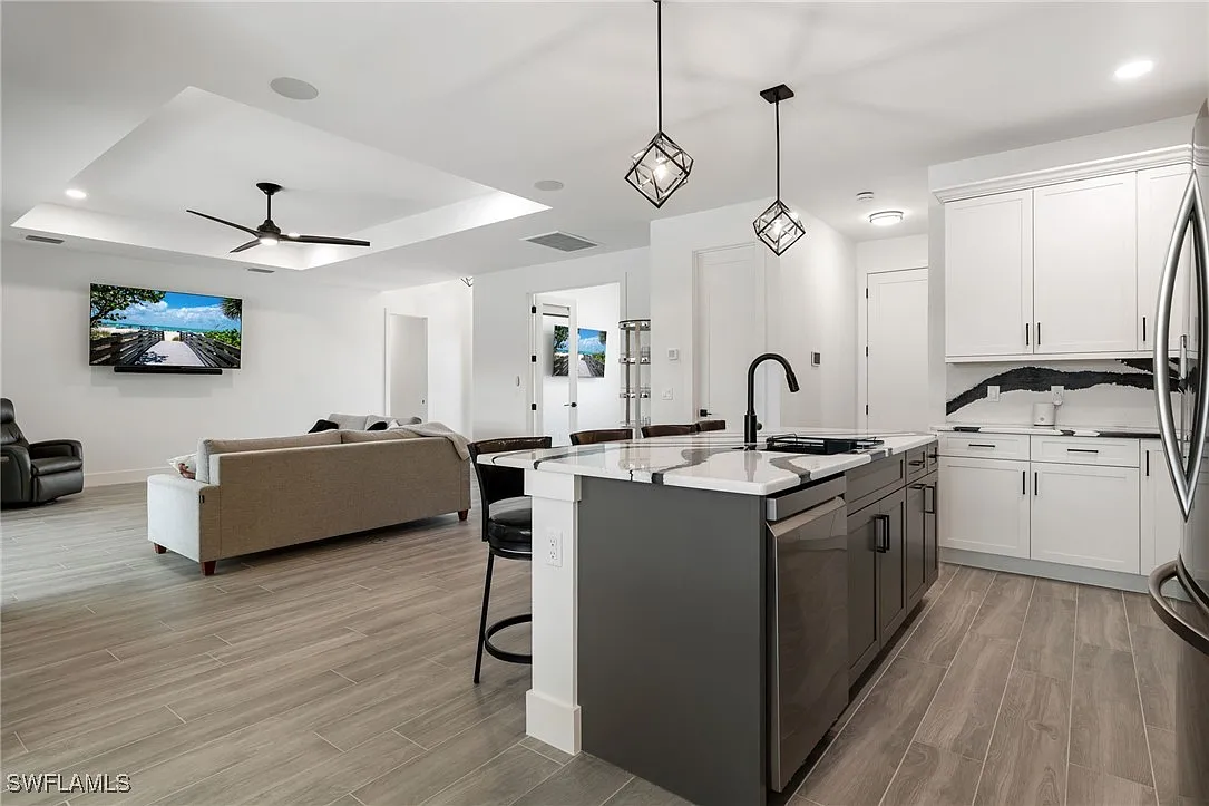 Kitchen living room at Sturgeon's Landing, a custom home built by Marvin Homes in Cape Coral, Florida