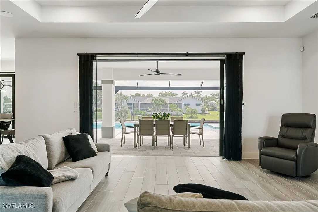 Living room backyard view at Sturgeon's Landing, a custom home built by Marvin Homes in Cape Coral, Florida