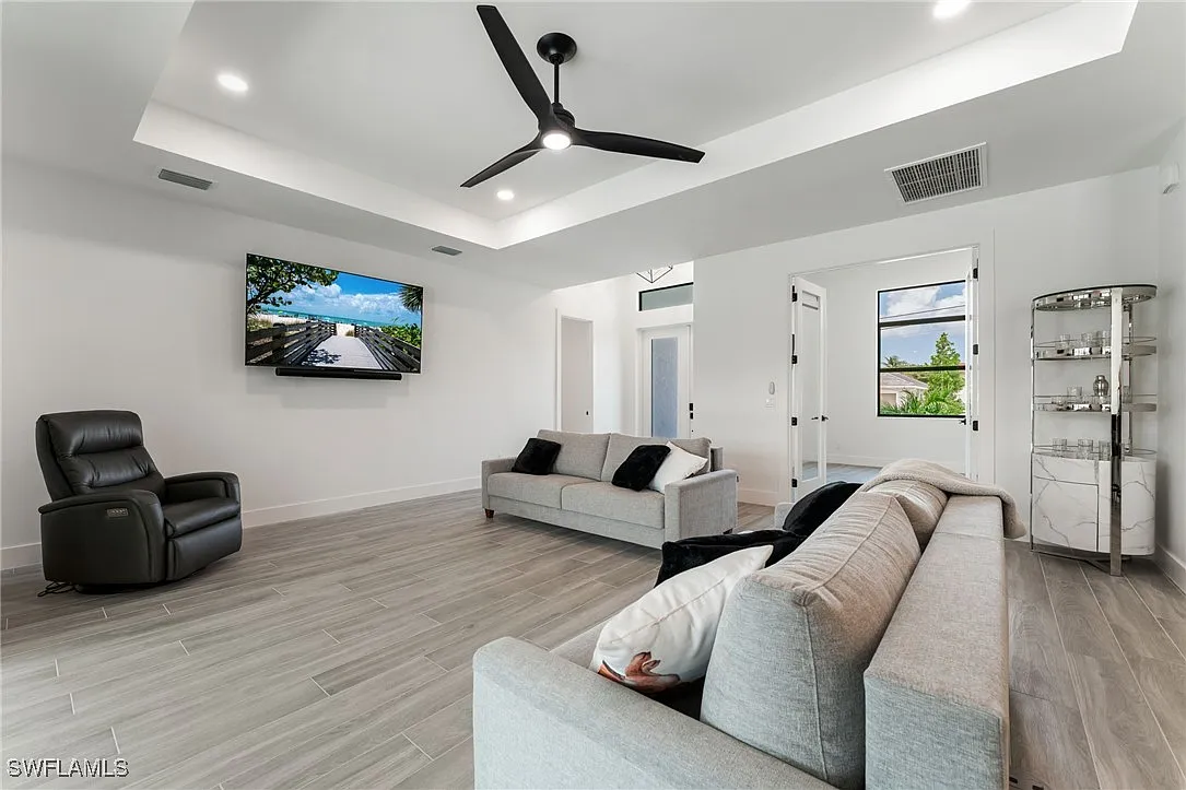 Living room side view at Sturgeon's Landing, a custom home built by Marvin Homes in Cape Coral, Florida