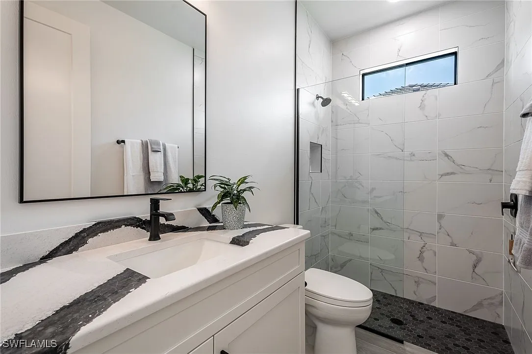 Second bathroom at Sturgeon's Landing, a custom home built by Marvin Homes in Cape Coral, Florida